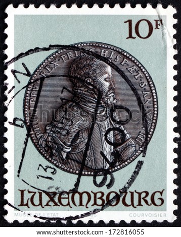 LUXEMBOURG - CIRCA 1985: a stamp printed in the Luxembourg shows King Philip II of Spain, Portrait Medal in the State Museum, circa 1985