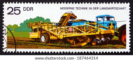 GDR - CIRCA 1977: a stamp printed in GDR shows Potato Digger and Loader, Motorized Modern Agriculture, circa 1977
