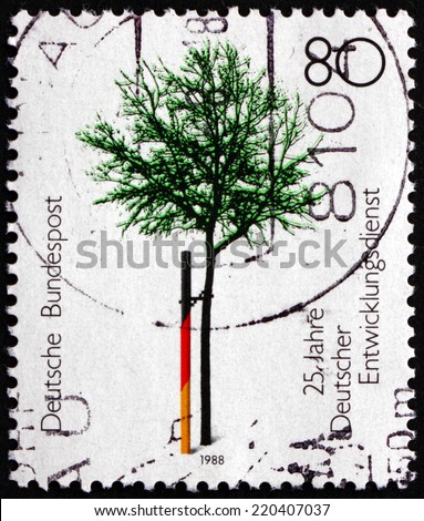 GERMANY - CIRCA 1988: a stamp printed in the Germany shows Tree, German Volunteer Service, 25th Anniversary, circa 1988