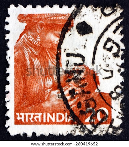 INDIA - CIRCA 1981: a stamp printed in India shows Mother Feeding Child, circa 1981