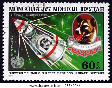 MONGOLIA - CIRCA 1982: a stamp printed in Mongolia shows Sputnik 2 and Laika, the First Dog in Space, circa 1982
