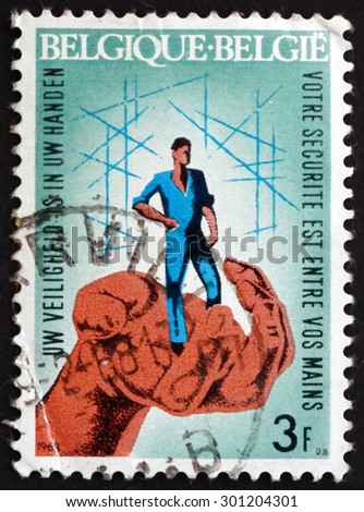 BELGIUM - CIRCA 1968: a stamp printed in the Belgium shows Hand Guarding Worker, Industrial Safety, circa 1968