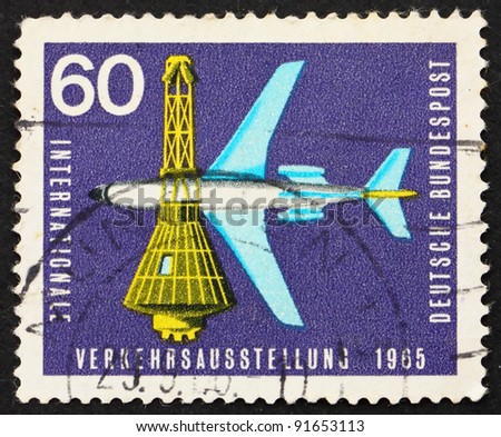 GERMANY - CIRCA 1965: A stamp printed in the Germany shows Jet Plane and Space Capsule, circa 1965
