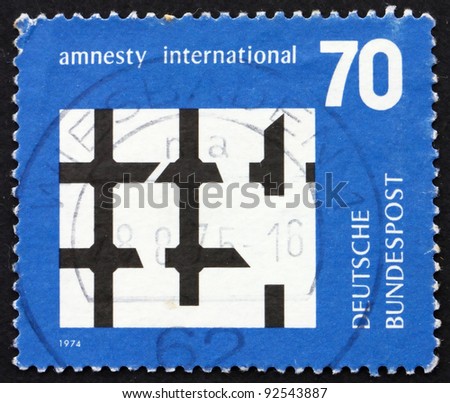 GERMANY - CIRCA 1974: a stamp printed in the Germany shows Broken Bars of Prison Window, Amnesty International, circa 1974