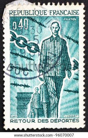 FRANCE - CIRCA 1965: a stamp printed in the France shows Returning Deportees, 1945, 20th Anniversary of the Return of People Deported during WWII, circa 1965