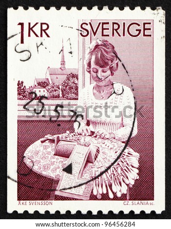 SWEDEN - CIRCA 1976: a stamp printed in the Sweden shows Bobbin Lace Maker from Vadstena, circa 1976