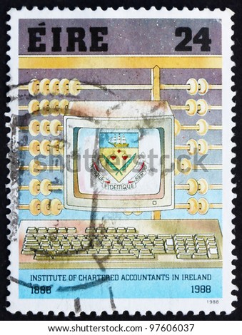 IRELAND - CIRCA 1988: A stamp printed in the Ireland shows Abacus and Personal Computer, Centenary of Institute of Chartered Accountants, circa 1988