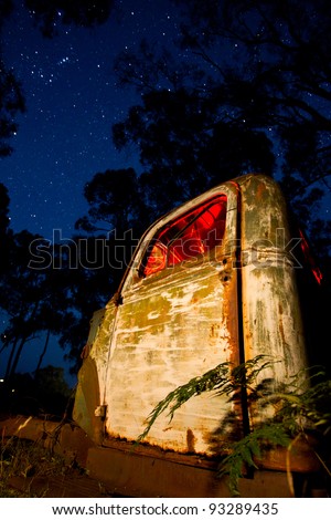 truck cabin under a clear starry night sky. High ISO some unavoidable noise present.