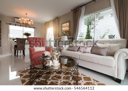 Beautiful room interior with hardwood floors and view of new luxury home.