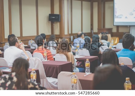 Business concept : asia people listen in business seminar presentation hall of hotel room,selective focus,vintage filter.