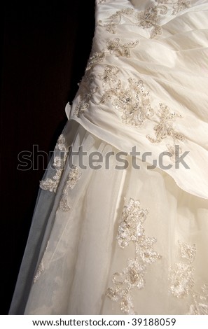 Wedding Dress close up on a black background