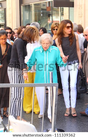 HOLLYWOOD - AUGUST 22, 2012: Actor Betty White(c) and her girls arrive to Hollywood Walk of Fame for fellow castmate Valerie Bertinelli August 22, 2012 Hollywood, CA