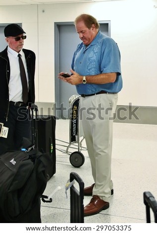 LOS ANGELES CA: Espn sportscaster Chris Berman at LAX arriving to Los Angeles to attend the Espy\'s being held at the Microsoft (formerly the Nokia) Theatre July 15, 2015.