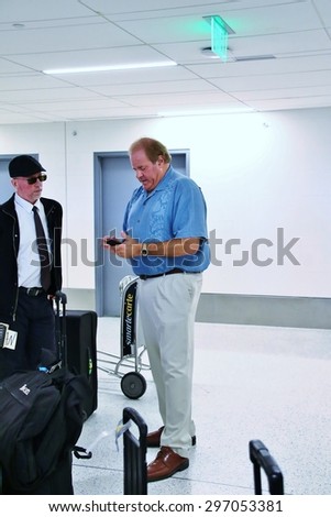 LOS ANGELES CA: Espn sportscaster Chris Berman at LAX arriving to Los Angeles to attend the Espy's being held at the Microsoft (formerly the Nokia) Theatre July 15, 2015.
