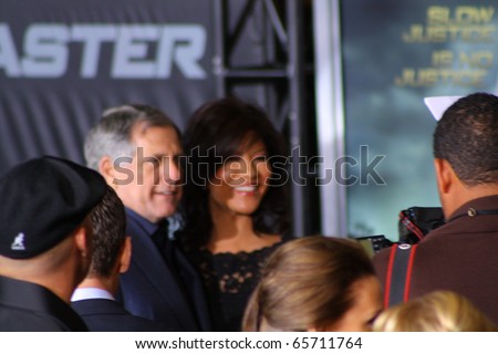 HOLLYWOOD - NOVEMBER 22: Cbs president Les Moonves and wife tv host Julie Chen at the premiere of the movie Faster at Grauman\'s Chinese Theatre November 22, 2010 in Hollywood, CA.