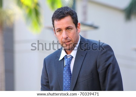 HOLLYWOOD - FEBRUARY 1: Comedian Adam Sandler on stage at his Walk of Fame ceremony on February 1, 2011 in Hollywood, CA 2011.