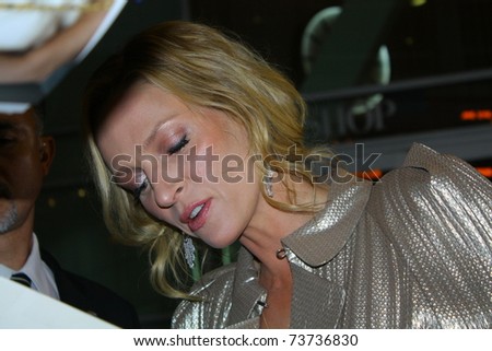 HOLLYWOOD - MARCH 22: Actor Uma Thurman at the red carpet premiere of the movie Ceremony at the Arclight Theatre March 22, 2011 in Hollywood, CA