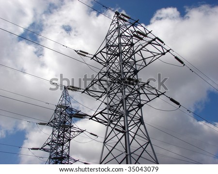 Power lines, electric main at the blue sky