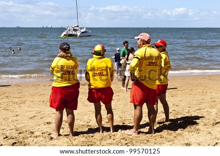 REDCLIFFE - APRIL 6: Beach lifesavers on duty during the annual Festival of Sails on April 6, 2012 in Redcliffe, Queensland. The Festival of Sails is held annually on Easter Friday.