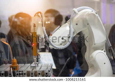 Industry 4.0 Robot concept .The robot arm is working smartly in the production department, the future factory.