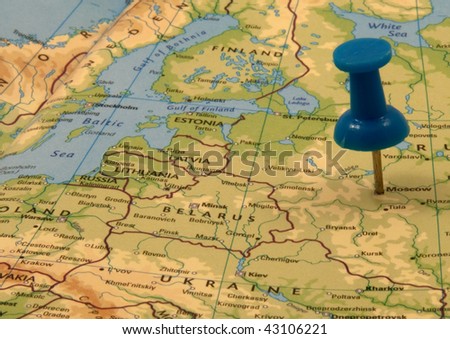 Blue push pin in a map, indicating the position of Moscow, Russia