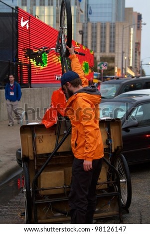 Austin, TX - March 10: SXSW Interactive Conference in Austin.   Austin Pedicabs are in high demand during the conference