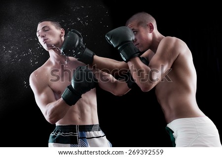 Boxing fighting in the ring