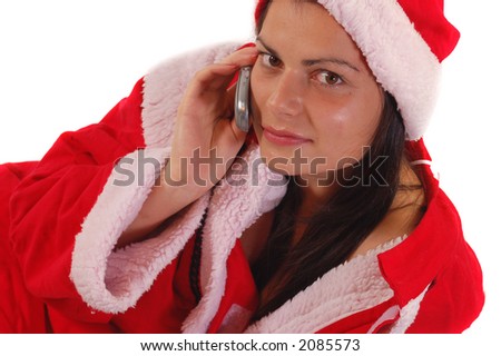 A young Santa Claus is talking on mobil phone looking foward and waiting  Christmas\'s and New Years holideys