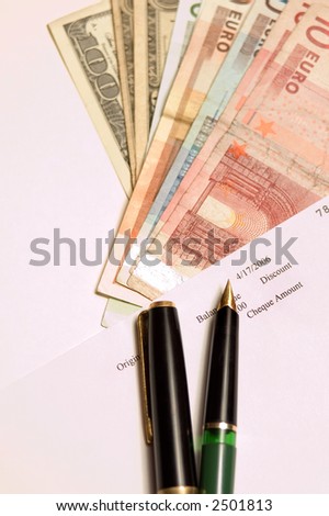 Cheque, money and pen, isolated on white