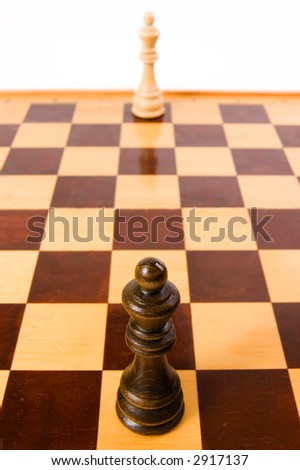 Two king chess on  chess table, focus on black king