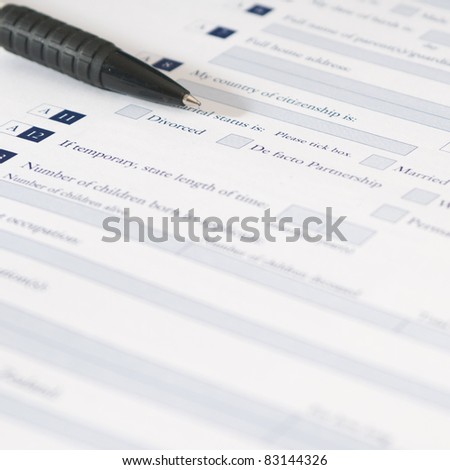 Pen and application form of marital status that requires to fill out his required information.
