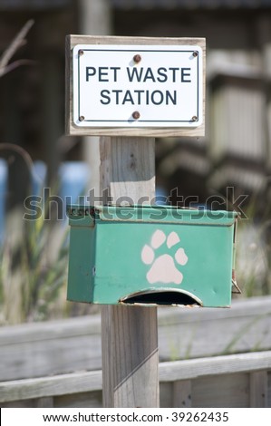 Pet Waste Station photographed near the beach.