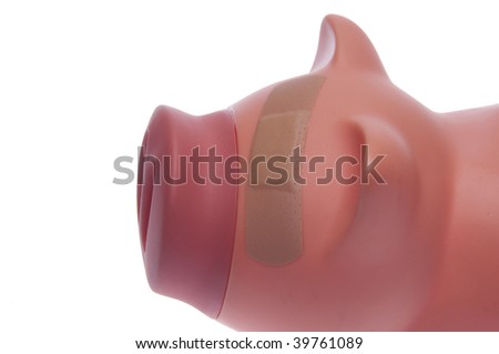 Piggy bank with a band aid over its eye.  Temporary solution to a financial problem or the H1N1 swine flu.  This is not a healthy pig.