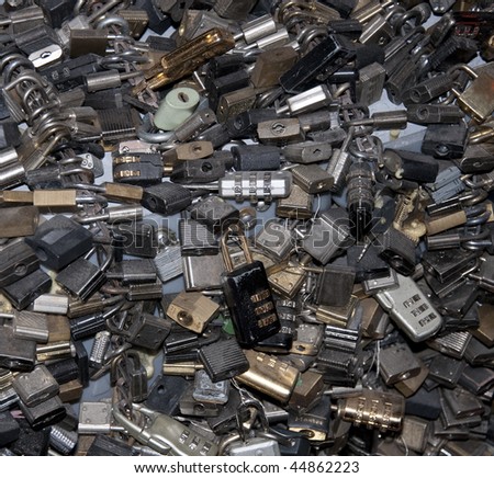 Many locks without keys.  A square background image.