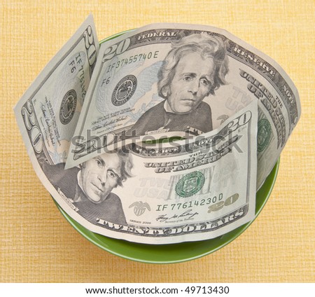 Money in a Bowl represents the cost of food.