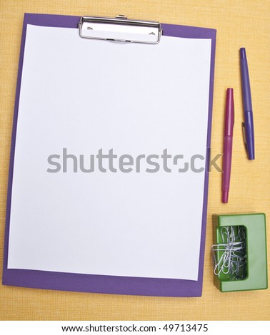 Vibrant clip board represents the modern office or student.