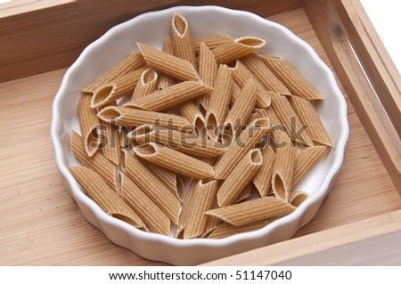 Whole Wheat Pasta in a White Dish Isolated on White with a Clipping Path.