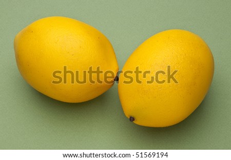 Lemons on a Sage Green Background.