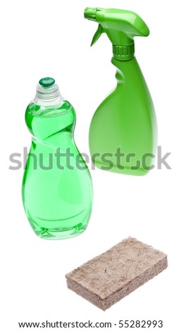 Green Cleaning Bottles with Sponge Made of Natural Fibers for Environmentally Friendly Cleaning Concepts.  Isolated on White with a Clipping Path.