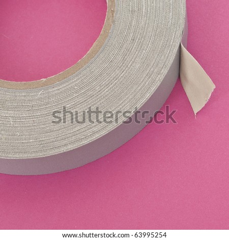 Close Up of Heavy Duty Tape on a Vibrant Background.  Everyday Object Close Up.