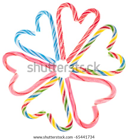 Variety of Candy Cane Candies in a Circle of Heart Shapes.  Isolated on White with a Clipping Path.