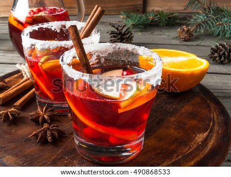 Fragrant autumn and winter sangria with oranges, apples, cranberries and spices