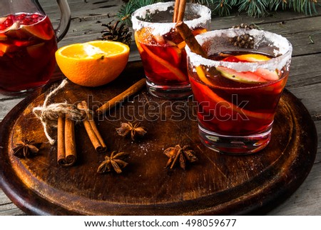 Fragrant autumn and winter sangria with oranges, apples, cranberries and spices