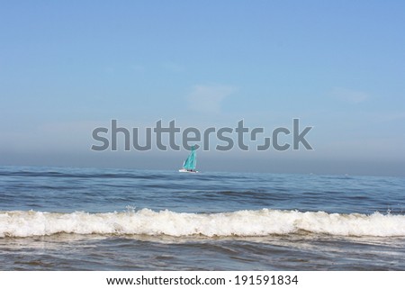 Waves of white foam Crown roll over the sea surface