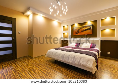 Modern Master Bedroom Interior With Picture Of Shipwreck On The Wall (Photo Coming From My Gallery)