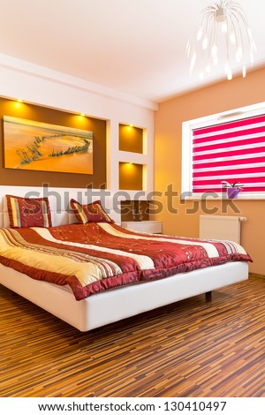 Master bedroom interior with picture of shipwreck on the wall. Photo of shipwreck is available in my gallery.