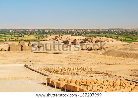 Desert at the Temple of Queen Hatshepsut with archaeologist house in Egypt
