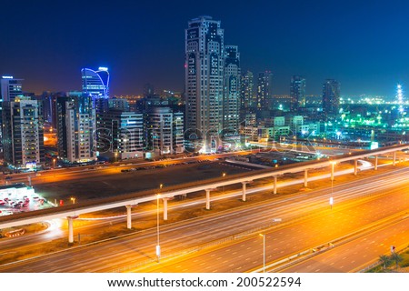 DUBAI, UAE - MARCH 30: Technology park of Dubai Internet City at night on 30 March 2014. Dubai Internet City is created by the government free economic zone for global information technology firms.