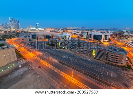 DUBAI, UAE - MARCH 31: Technology park of Dubai Internet City at night on 31 March 2014. Dubai Internet City is created by the government free economic zone for global information technology firms.