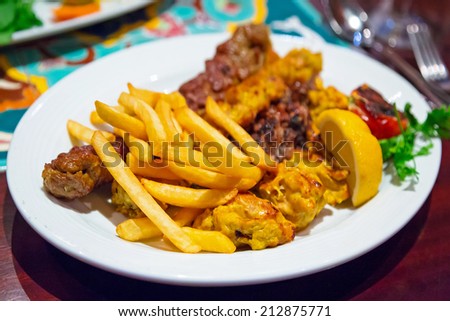 Lebanese food with chips on the plate